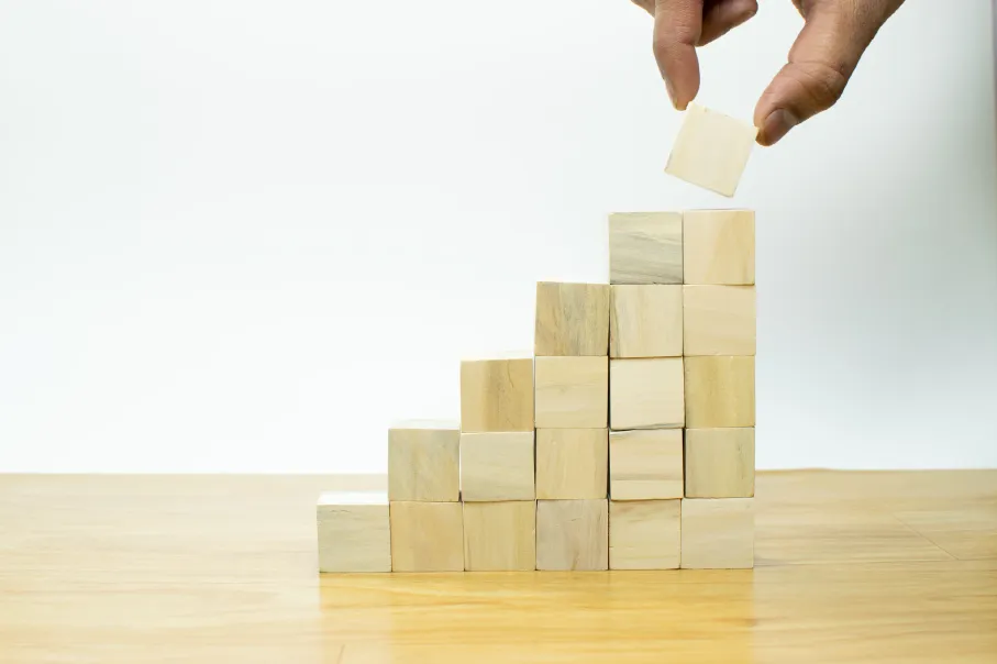 Wooden blocks stacked upward